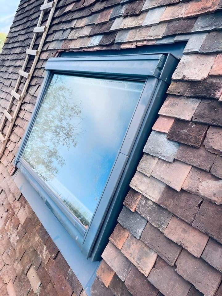 Toit en pente et fenêtre de toit Argentan