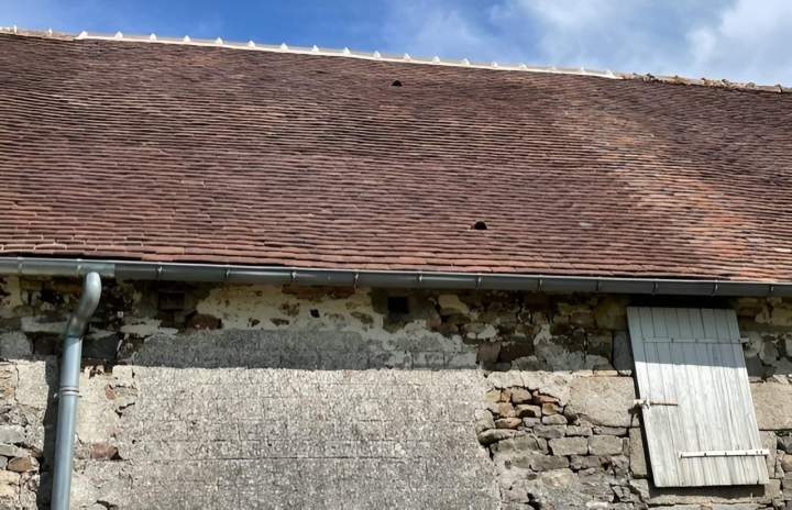 Vieille bâtisse avec toit en tuiles à rénover Argentan